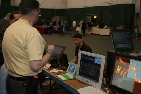 Attendees on Foreground, Gary in background; Dual-monitor Ubuntu Machine to the right